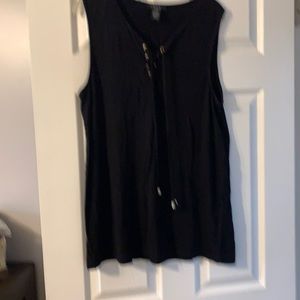 Black sleeveless top.